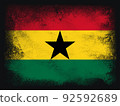 Ghana Flag design composition of exploding powder and paint, isolated on a black background for copy space. Colorful abstract dust particles explosion. World cup 2022 football symbol for printing 92592689