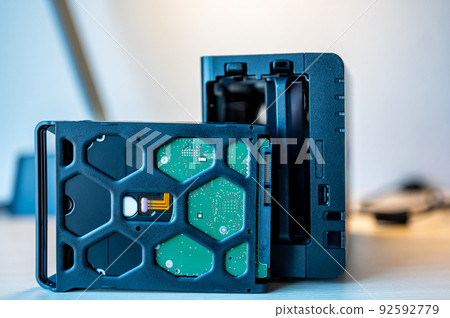 network attached storage NAS with a single bay pulled setup at a home office and remote work redundancy 92592779