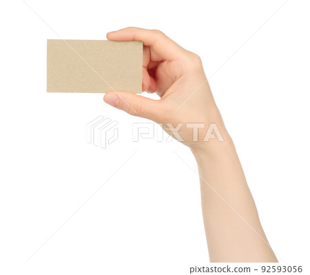 Hand holds blank business card on white background 92593056