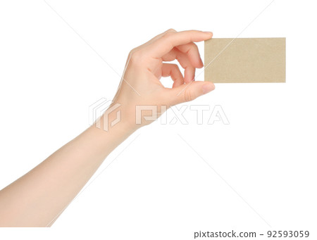 Hand holds blank business card on white background 92593059