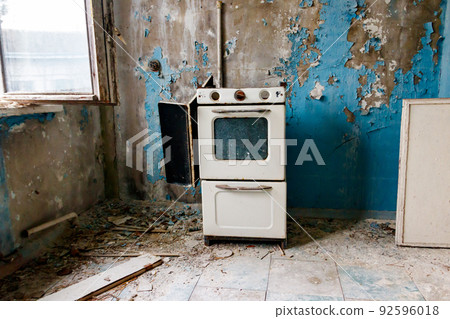 Kitchen of abandoned apartment in the ghost town Pripyat in Chernobyl Exclusion Zone, Ukraine 92596018