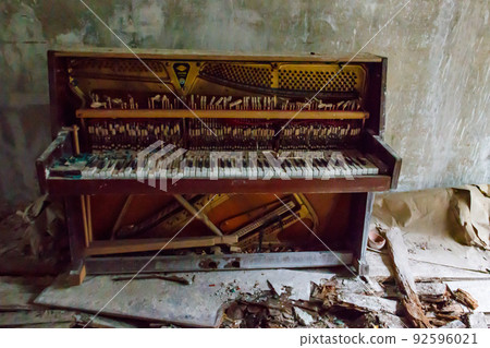 Old piano in abandoned apartment in the ghost town Pripyat in Chernobyl Exclusion Zone, Ukraine 92596021