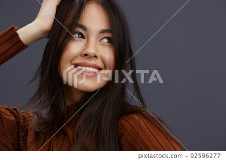 portrait woman fun brown sweater posing casual wear studio model portrait woman fun brown sweater posing casual wear studio model 92596277