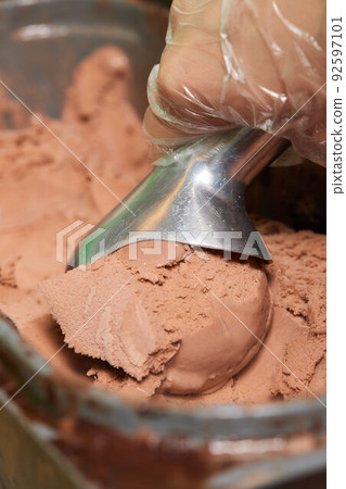 ice cream scooped out of container. close-up. ice cream scooped out of container. close-up. 92597101