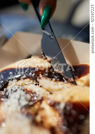Delicious breakfast in the summer cafe. a dessert of Viennese waffles with a scoop of ice cream. 92597225