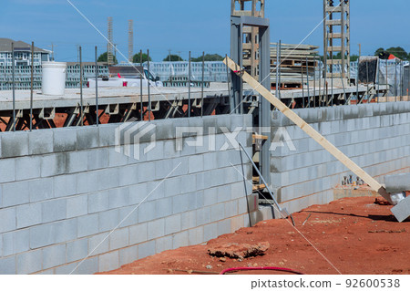 Building scaffolding to mount concrete blocks for the purpose of mounting walls Building scaffolding to mount concrete blocks for the purpose of mounting walls 92600538