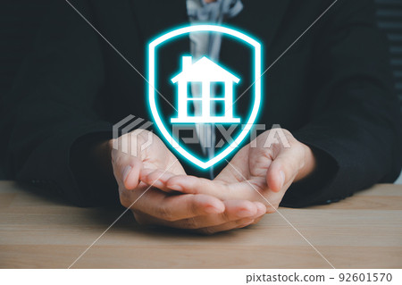 House or Family Insurance Concept, Home Icon floating over a Careful Gesture Hand of a Businessman, Concept of home and real estate Property insurance House or Family Insurance Concept, Home Icon floating over a Careful Gesture Hand of a Businessman, Concept of home and real estate Property insurance 92601570