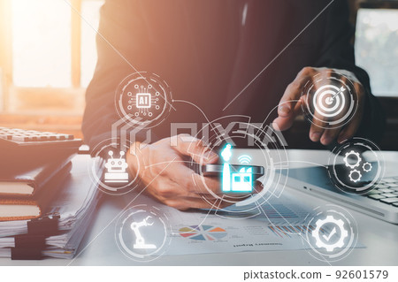 Smart industry 4.0 concept, Person hand using smart phone with VR screen smart industry icon, AI, Artificial Intelligence, Automation robot arm, Smart factory. 92601579