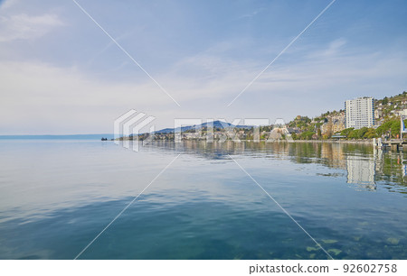 A landscape of Lake Geneva on a sunny day from the lakeside promenade at Montreux city, Switzerland A landscape of Lake Geneva on a sunny day from the lakeside promenade at Montreux city, Switzerland 92602758