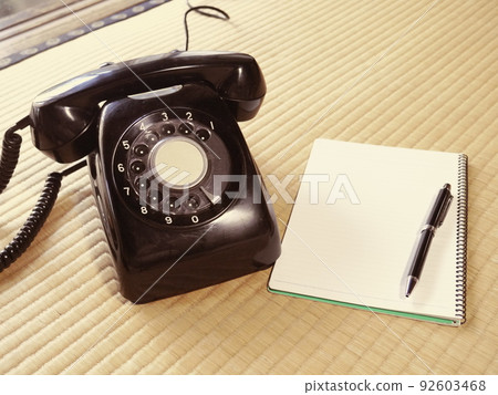 Black phone and notepad Black phone and notepad 92603468