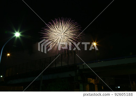 [Echizen City, Fukui Prefecture, Echizen City Summer Festival Fireworks, August] Fireworks launched from under the elevated Kosohara Takefu Line 92605188