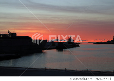 Beautiful view of Naha Port at dusk dyed in orange 92605621