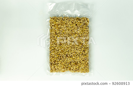pine nuts packed in a bag on a white background, isolated pine nuts packed in a bag on a white background, isolated 92608913