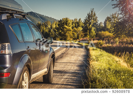 car for traveling with a mountain road car for traveling with a mountain road 92608978