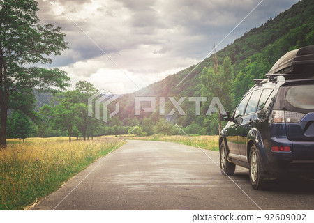 car for traveling with a mountain road 92609002
