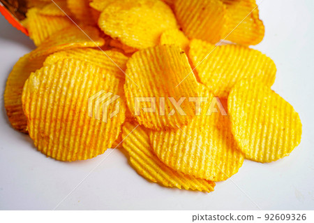 Potato chips in open bag, delicious BBQ seasoning spicy for crips, thin slice deep fried snack fast food. 92609326