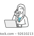 A woman who calls while watching a computer 92610213