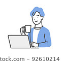 A man relaxing in front of a laptop 92610214