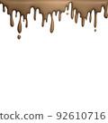 melted chocolate dripping on white background 92610716