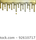 melted gold dripping on white background 92610717