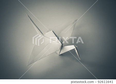 White paper crane origami isolated on blank background 92611641