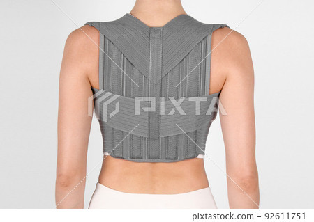 Posture Corrector isolated on white. Orthopedic lumbar support products. Lumbar Support Belts For Back Clavicle Spine. Lumbar Waist Support Belt Strong Lower Back Brace Support. Lumbar brace. Posture Corrector isolated on white. Orthopedic lumbar support products. Lumbar Support Belts For Back Clavicle Spine. Lumbar Waist Support Belt Strong Lower Back Brace Support. Lumbar brace. 92611751