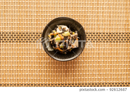 Fresh plum salad with hijiki and steamed chicken Fresh plum salad with hijiki and steamed chicken 92612687