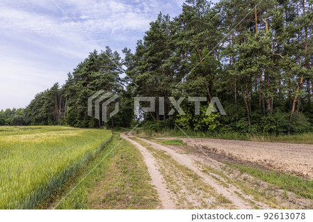 unpaved highway in rural areas 92613078