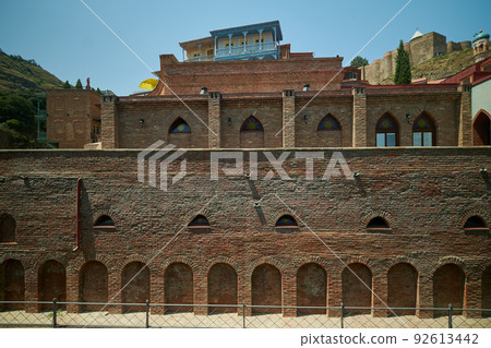 Abanotubani district in Old Tbilisi, Georgia where most of the Sulphur baths are located day light view. 92613442