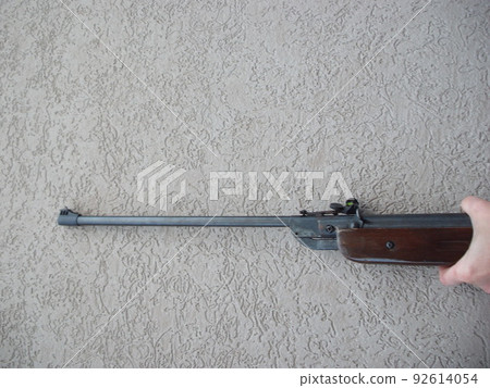 Folding air rifle for firing bullets 92614054
