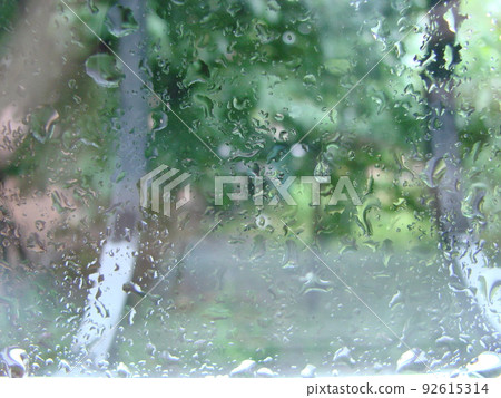 rainy days rain drops on the window surface rainy days rain drops on the window surface 92615314