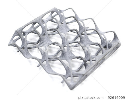 Model printed on 3D printer isolated on white background. Object details printed on 3D printer from plastic close-up. Prototype of shape made by 3d printer. Concept new modern printing technology 92616009