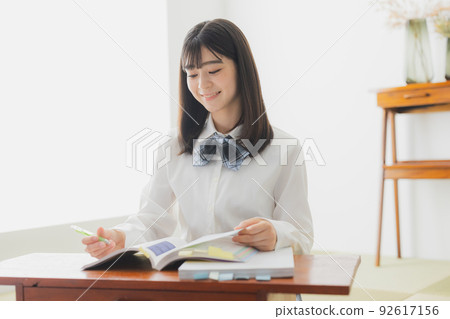 High school girl studying living room 92617156