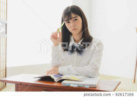 High school girl studying living room 92617166