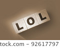 LOL sign. Wooden blocks on a white wooden background 92617797