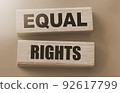 Equal Rights, words on wooden blocks on red background. Equality social concept 92617799