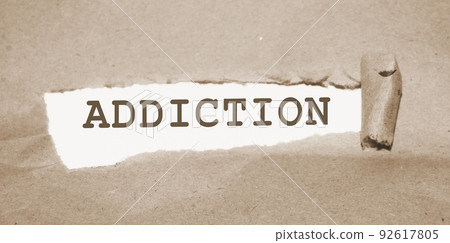 Addiction word under Brown torn paper . Stop smoking quit drinking refuce gaming and gambling concept Addiction word under Brown torn paper . Stop smoking quit drinking refuce gaming and gambling concept 92617805