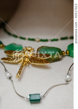 Costume jewelry.A necklace made of costume jewelry. Costume jewelry.A necklace made of costume jewelry. 92617823