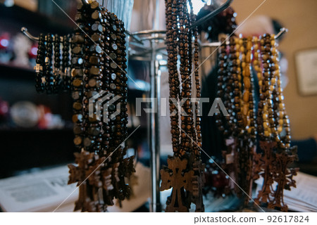 Shop window with necklaces and jewelry. Custome jewelry on display Shop window with necklaces and jewelry. Custome jewelry on display 92617824