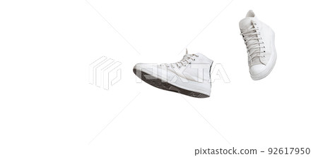 Casual, stylish, white gumshoes, sneakers isolated over white studio background. Flyer Casual, stylish, white gumshoes, sneakers isolated over white studio background. Flyer 92617950