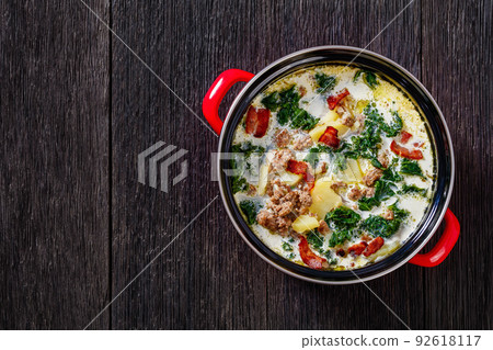 Zuppa Toscana,Tuscan Soup in red pot, top view Zuppa Toscana,Tuscan Soup in red pot, top view 92618117