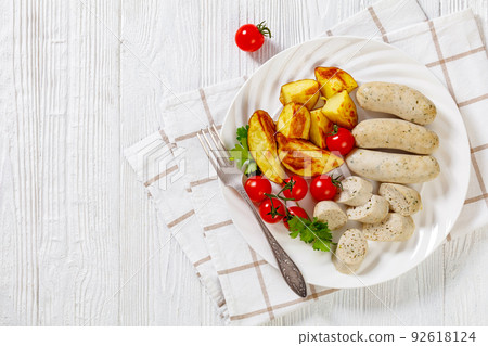 Weisswurst, white sausage of minced veal and pork Weisswurst, white sausage of minced veal and pork 92618124