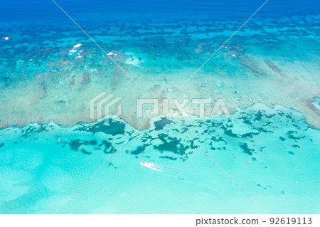 Caribbean sea with reef and azure water, tropical nature. Aerial top view Caribbean sea with reef and azure water, tropical nature. Aerial top view 92619113