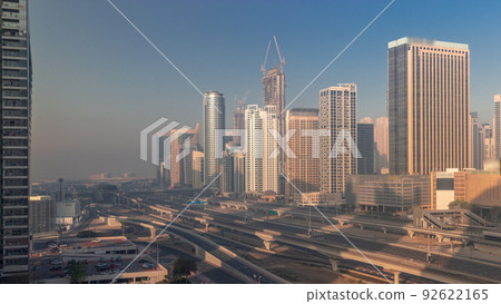 Dubai Marina skyscrapers and Sheikh Zayed road with metro railway aerial timelapse, United Arab Emirates 92622165