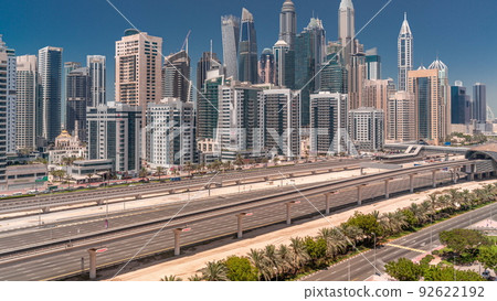 Dubai marina tallest block of skyscrapers all day timelapse. Dubai marina tallest block of skyscrapers all day timelapse. 92622192