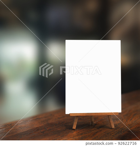 White paper counter menu on blurred restaurant background 92622716