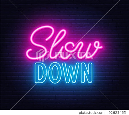 Slow Down neon lettering on brick wall background. Slow Down neon lettering on brick wall background. 92623465