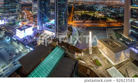 Gate Avenue promenade located in Dubai international financial center aerial night timelapse. Gate Avenue promenade located in Dubai international financial center aerial night timelapse. 92623583