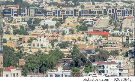 Aerial view of apartment houses and villas in Dubai city timelapse, United Arab Emirates Aerial view of apartment houses and villas in Dubai city timelapse, United Arab Emirates 92623642
