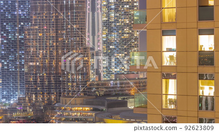 Shopping mall exterior with reastaurants on balconies night timelapse in Dubai, United Arab Emirates Shopping mall exterior with reastaurants on balconies night timelapse in Dubai, United Arab Emirates 92623809